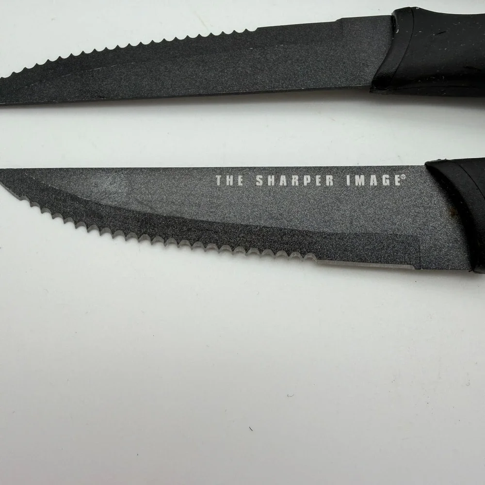 The Sharper Image 4 Piece Steak Knife Set Black Non-Stick Serrated Blade Utility